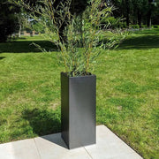 Long planters arranged in a row along a patio